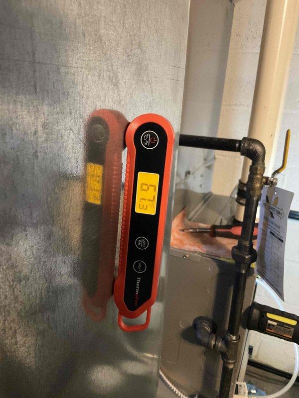 Performed scheduled maintenance on a 4-year-old natural gas furnace. Conducted diagnostic testing with digital instruments showing readings of 67 and 19.9, verifying proper system operation. Inspected ductwork and ventilation components to ensure optimal heating performance.