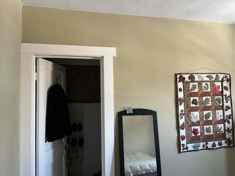 Conducted site assessment for an add-on mini-split installation in west-facing bedroom. Evaluated space dimensions and layout, noting potential wall-mounted unit location. Customer is considering cooling-only option for temperature management during warm periods.