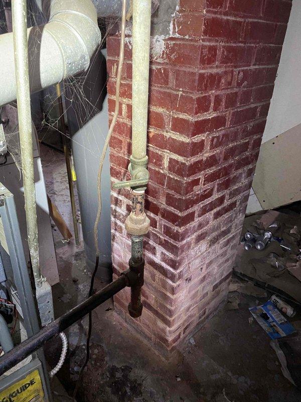 Responded to service call for an older gas furnace that would not light. Upon inspection, found significant dust accumulation throughout the system and noted the furnace was venting into a brick chimney structure showing signs of deterioration. Cleaned critical components and restored proper ignition sequence, enabling normal heating operation.