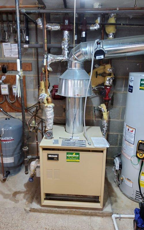 Performed comprehensive tune-up service on both HP boiler and furnace systems. Inspected circulator pump, valves, and piping connections for proper operation. Completed requested return air modification on second floor, installing 14x6x7 straight boot, 7x6 reducer, and 14x6 return air grille to improve system efficiency.