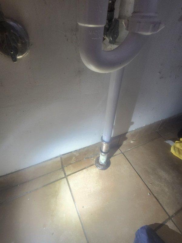 Responded to service call for toilet leaking at base. Upon inspection, identified water seepage at the wax ring seal. Removed toilet, replaced deteriorated wax ring with new seal, and reinstalled fixture with proper bolting torque. Verified complete resolution of leak with test flush and visual inspection.