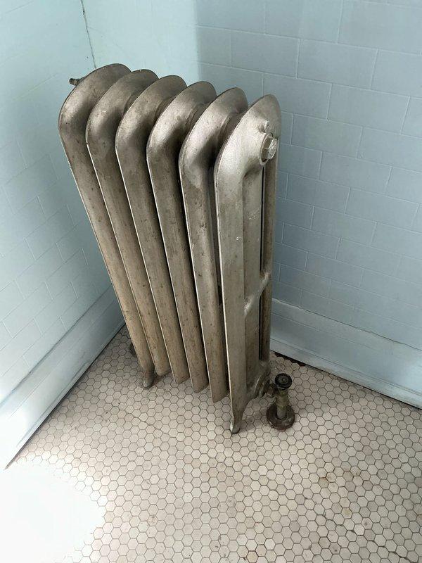 Performed scheduled steam boiler tune-up service. Identified customer's concern about a major leak from one of the pipes, which was determined to be unrelated to the maintenance work. Inspected and documented condition of cast iron radiators throughout the property, noting normal wear consistent with system age.