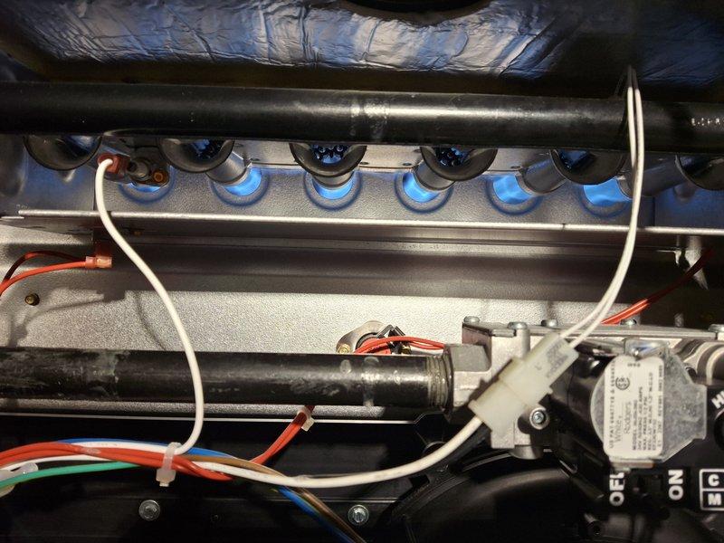 Performed scheduled furnace tune-up with comprehensive inspection of gas-fired heating system. Verified proper burner operation with even blue flame pattern across all ports and conducted diagnostic testing using UEI meter to measure static pressure, differential pressure, and other critical parameters. All components functioning within normal specifications; no issues identified.