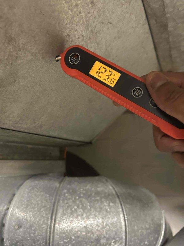 Performed scheduled HVAC tune-up service. Conducted temperature differential testing with digital thermometer, recording supply temperature of 127°F. Inspected and verified system operation within manufacturer specifications. All components functioning properly with no issues detected.