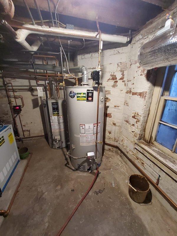 Performed a flush service on a 7-year-old 75-gallon Bradford White water heater due to customer's report of rapidly diminishing hot water supply. Completed full system flush to remove sediment buildup and inspected all connections and valves for proper operation. Service addressed the performance issue while maintaining the existing plumbing infrastructure in the basement utility area.