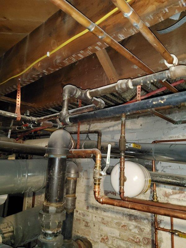 Performed a flush service on a 7-year-old 75-gallon Bradford White water heater due to customer's report of rapidly diminishing hot water supply. Completed full system flush to remove sediment buildup and inspected all connections and valves for proper operation. Service addressed the performance issue while maintaining the existing plumbing infrastructure in the basement utility area.