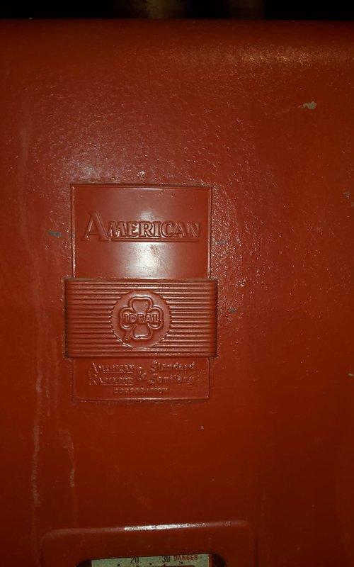 Diagnosed 40-50 year old American Standard hot water heating system that was overheating the residence and emitting burning odors during operation. Inspection revealed the aging boiler system is no longer responding properly to thermostat commands. Recommended replacement of the antiquated system due to age, condition, and safety concerns.