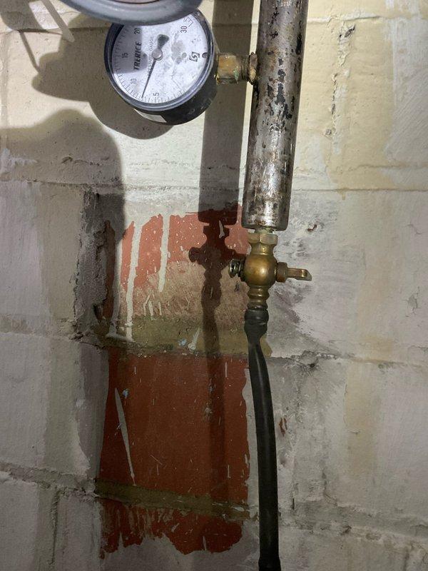 Responded to a gas leak service call after utility company had shut off gas supply. Conducted pressure test on system using calibrated gauge, revealing deteriorated gas valves at furnace and hot water heater. Replaced both gas valves to restore system integrity and ensure safe operation, allowing for proper pressurization of the gas line system.