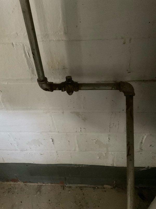 Responded to a gas leak service call after utility company had shut off gas supply. Conducted pressure test on system using calibrated gauge, revealing deteriorated gas valves at furnace and hot water heater. Replaced both gas valves to restore system integrity and ensure safe operation, allowing for proper pressurization of the gas line system.