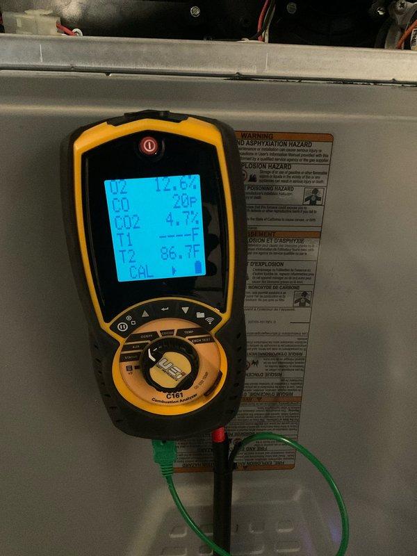Performed 8-12 heating maintenance under Home Plan Heating Tune Up service. Conducted combustion analysis with readings of 12.0% O2, 28 PPM CO, and 4.7% CO2 at operating temperature of 86.7°F, confirming system is operating within safe parameters.