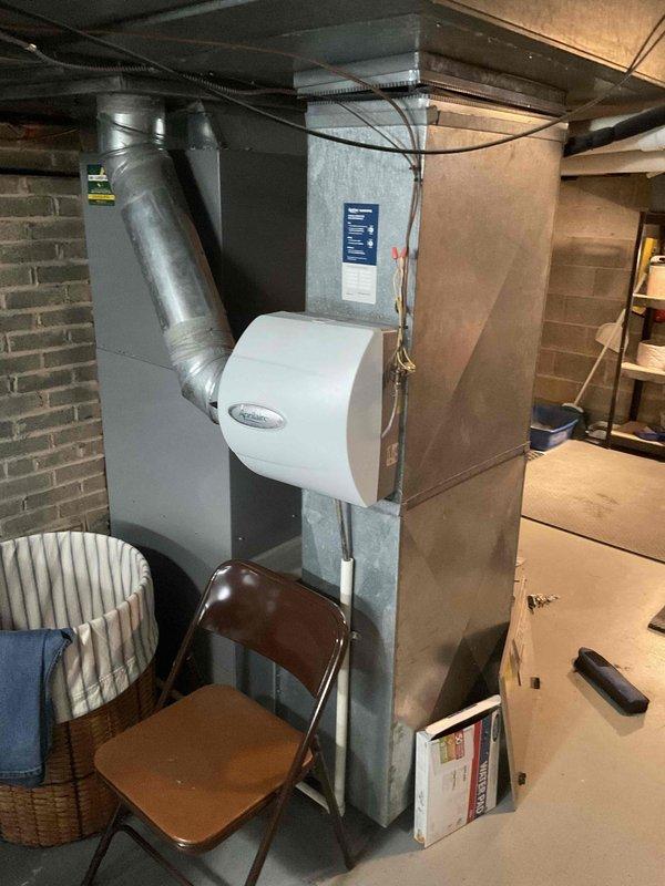 Performed 8-12 heating maintenance under Home Plan Heating Tune Up service. Conducted combustion analysis with readings of 12.0% O2, 28 PPM CO, and 4.7% CO2 at operating temperature of 86.7°F, confirming system is operating within safe parameters.