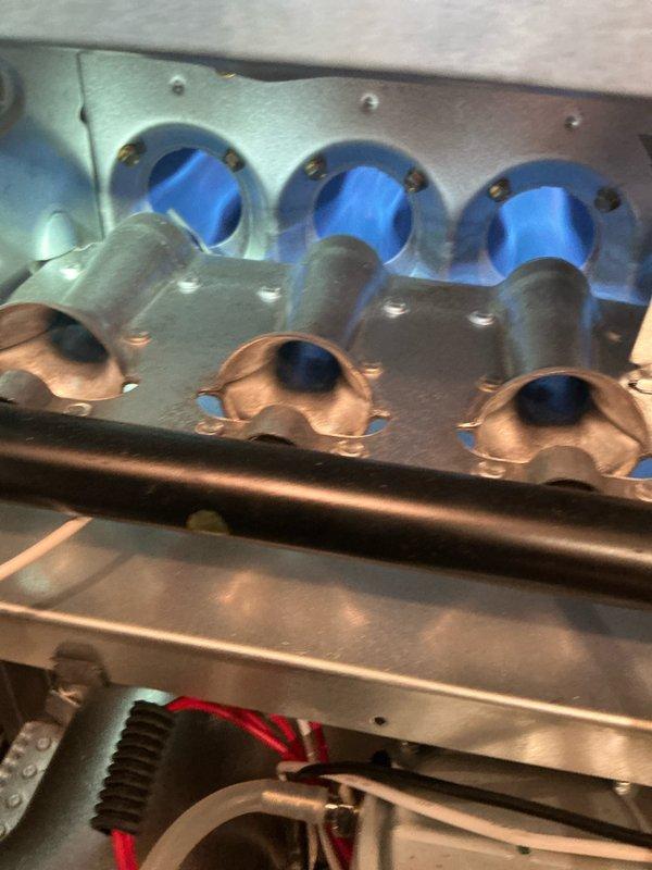 Completed preventative maintenance on the furnace system. Inspected and confirmed proper combustion with healthy blue flame pattern at burner assembly. Technician verified blower motor operation and recommended customer install new filter.