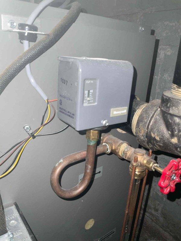 Performed scheduled maintenance on multiple heating systems including boiler, garage heater, and two furnaces under MVP service plan. Inspected Honeywell control system (model 1097) and associated valves and piping connections. Diagnosed excessive noise from boiler (loud clanging) and recommended further assessment of potential mechanical issues or water flow restrictions.