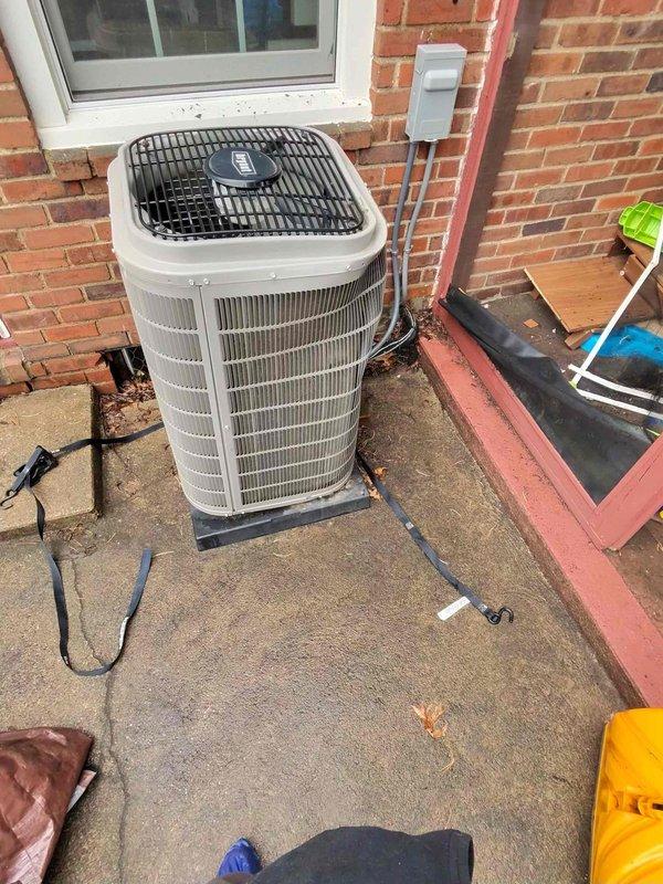 Responded to service call for 3-year-old A/C condenser unit damaged by falling ice. Upon inspection, documented extensive damage to the outdoor unit including crushed condenser coils and cabinet. Installed replacement condensing unit on existing pad, reconnected refrigerant lines, and verified proper operation after startup. System now functioning within manufacturer specifications.