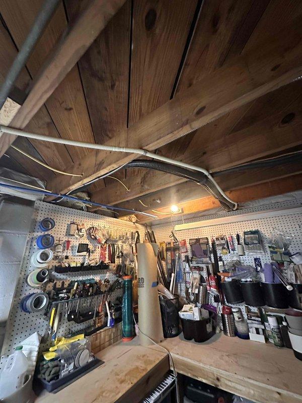 Replaced deteriorated line set on mini-split system due to refrigerant leakage. Performed nitrogen pressure test to verify system integrity, then evacuated system to proper vacuum levels. System was charged and cycled to confirm proper operation with new line set installation.