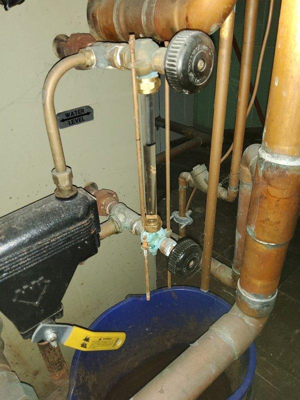 Performed scheduled maintenance on steam boiler system. Inspected copper piping, valves, and water level indicator, noting some surface corrosion and oxidation at connection points. Identified potential slow leak requiring future attention as evidenced by greenish-blue patina formation on copper pipes.