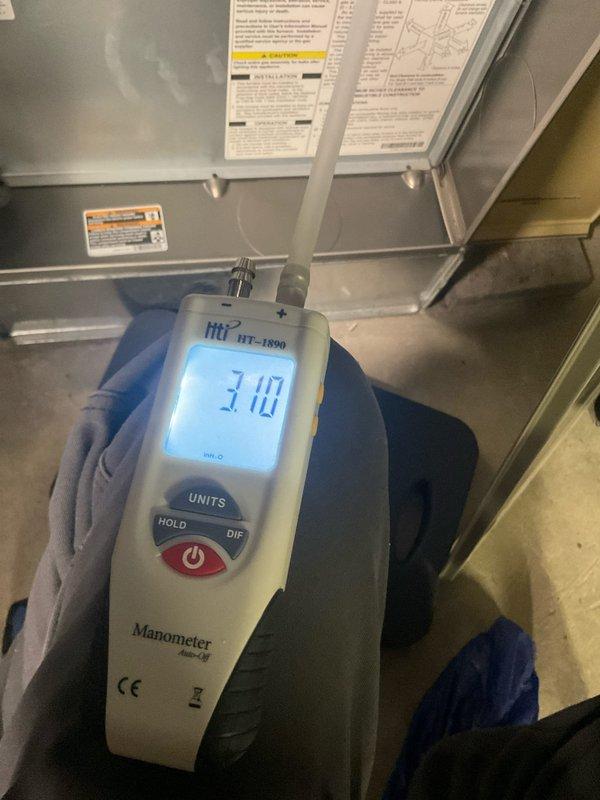 Performed scheduled heating maintenance service on residential furnace system. Completed gas pressure testing with digital manometer (HT-1890), recording a reading of 3.10. Inspected all components including heat exchanger, ductwork connections, and venting system with all systems operating within normal parameters.