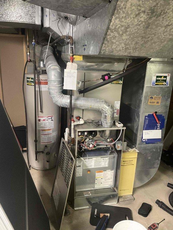 Performed scheduled heating maintenance service on residential furnace system. Completed gas pressure testing with digital manometer (HT-1890), recording a reading of 3.10. Inspected all components including heat exchanger, ductwork connections, and venting system with all systems operating within normal parameters.