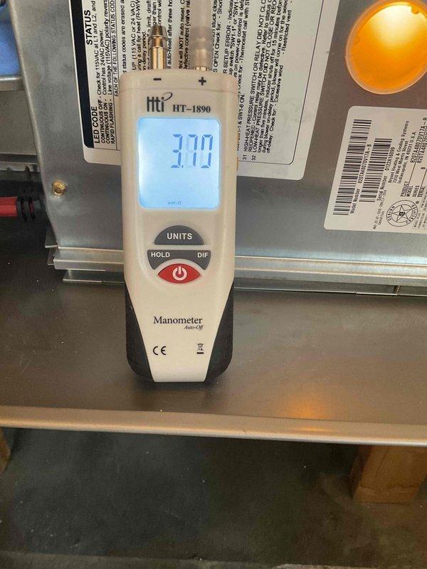 Performed routine 8-12 month maintenance on dual heating systems. Conducted gas pressure testing using digital manometer (HT-1890), confirming proper readings at 3.70. Inspected furnace internal components including circuit board connections, blower assembly, and flue system, ensuring all were in proper working condition.