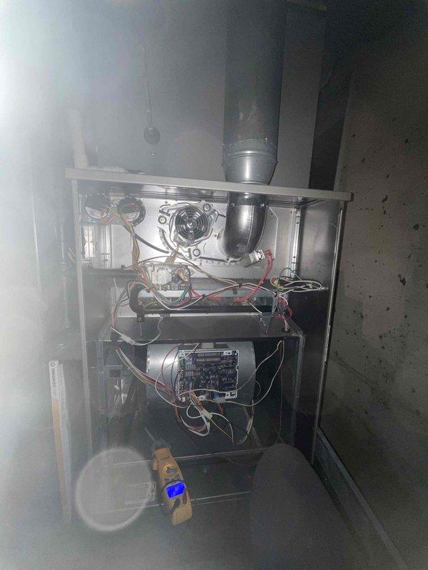 Performed routine 8-12 month maintenance on dual heating systems. Conducted gas pressure testing using digital manometer (HT-1890), confirming proper readings at 3.70. Inspected furnace internal components including circuit board connections, blower assembly, and flue system, ensuring all were in proper working condition.