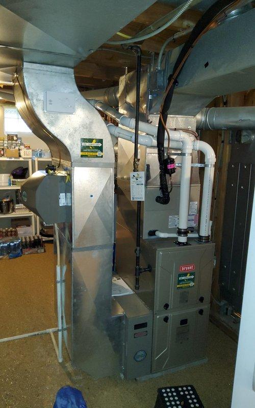 Performed scheduled maintenance on residential heating system. Inspected furnace components and verified proper combustion with blue flame indication. System is operating correctly with all connections secure and ventilation functioning as designed.