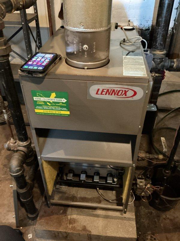 Performed annual inspection and tune-up on Lennox steam boiler system and hot water tank. Identified minor corrosion at the cold water connection point requiring monitoring. All other components functioning properly with no immediate service requirements.