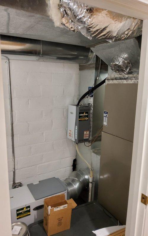 Performed scheduled furnace maintenance service, including removal and replacement of water panel and furnace filter. Installed new Aprilaire Media (501/510 model) in the customer's HVAC system located in utility room. Visual inspection of the dual-unit installation and associated ductwork confirmed proper configuration with no visible issues noted.