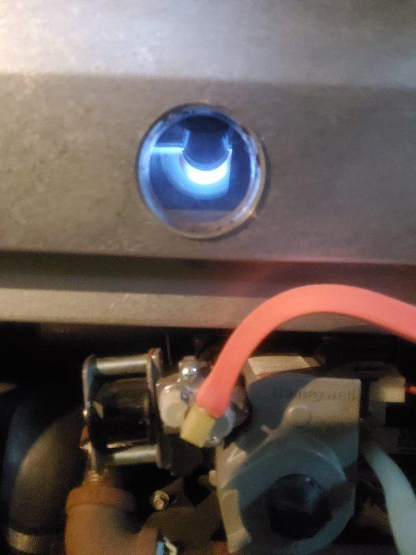 Performed annual home plan inspection on heating system. Verified proper operation of gas ignition system and flame through inspection port. Checked Honeywell gas valve and control components for normal function. Inspected blower motor assembly including hub, shaft, and fan blades for proper operation and wear.