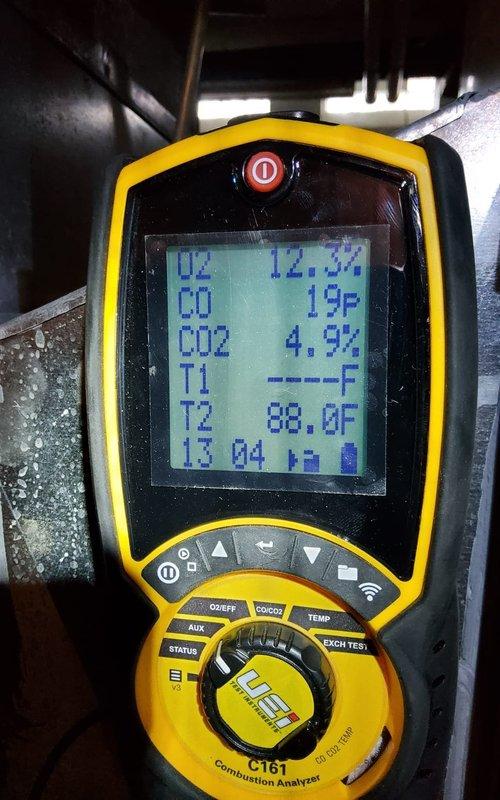 Performed scheduled maintenance on 6-year-old furnace under Home Plan Heating Tune Up service. Conducted combustion analysis using UEi C161 analyzer, which measured O2 at 12.3%, CO at 19P, CO2 at 4.9%, and stack temperature at 88.0°F. Inspected ductwork connections and condensate drain system, confirming proper installation with secure metal tape at joints.