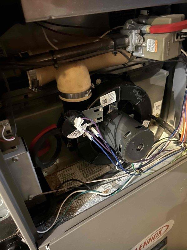 Replaced failed inducer motor on Lennox furnace and cleaned blower assembly to restore proper operation. Noted age-related wear on system components during service. Recommended replacement with new, more efficient equipment as preventative measure.