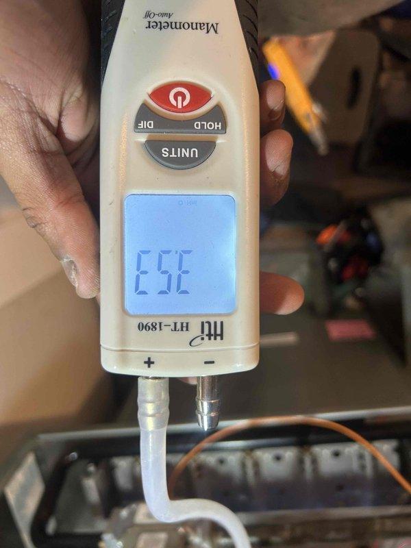 Performed scheduled maintenance on 14-year-old furnace. Conducted comprehensive diagnostic testing using manometer (HT-1890) to verify proper gas pressure and UEi combustion analyzer (C167) to evaluate combustion efficiency. Readings confirmed system is operating within manufacturer specifications with acceptable O2 (7.5%), CO (5P), and CO2 (7.4%) levels at operating temperature (318.3F).