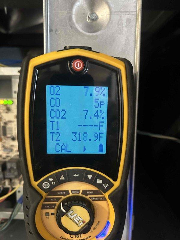 Performed scheduled maintenance on 14-year-old furnace. Conducted comprehensive diagnostic testing using manometer (HT-1890) to verify proper gas pressure and UEi combustion analyzer (C167) to evaluate combustion efficiency. Readings confirmed system is operating within manufacturer specifications with acceptable O2 (7.5%), CO (5P), and CO2 (7.4%) levels at operating temperature (318.3F).