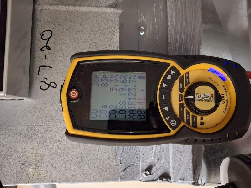 Performed routine maintenance on 5-year-old gas furnace. Conducted combustion analysis using UEI digital analyzer confirming proper flame characteristics and operation. Inspected burner assembly (unit #16201) with all flames burning blue and even, indicating complete combustion and optimal performance.