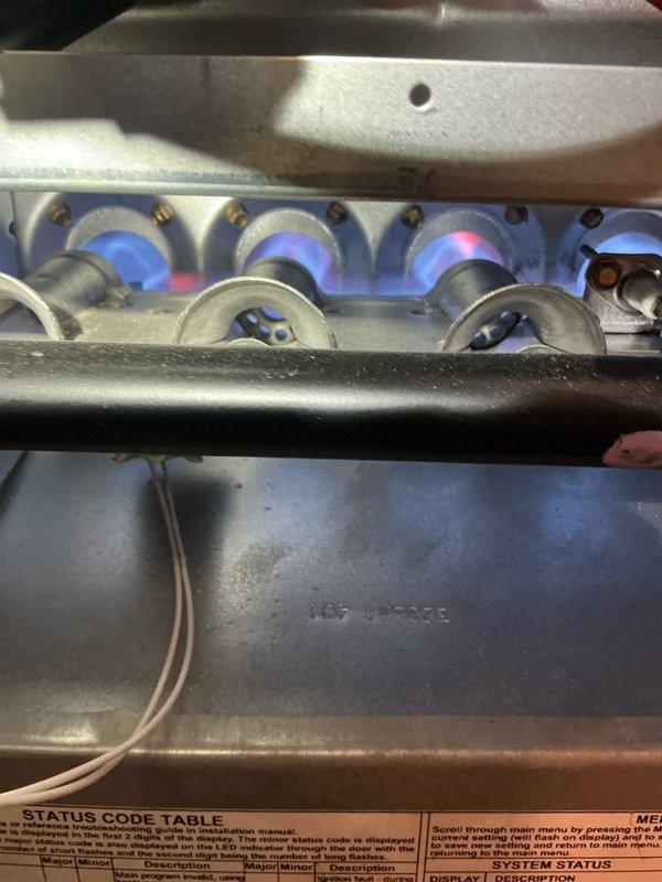 Performed routine furnace maintenance on natural gas system per scheduled tune-up. Inspected and verified proper operation of blower motor assembly with particular attention to the hub and blade integrity. Checked burner assembly for proper flame characteristics - observed consistent blue flames indicating complete combustion. Inspected humidifier as requested and ensured all components were functioning correctly. System is operating within normal parameters.