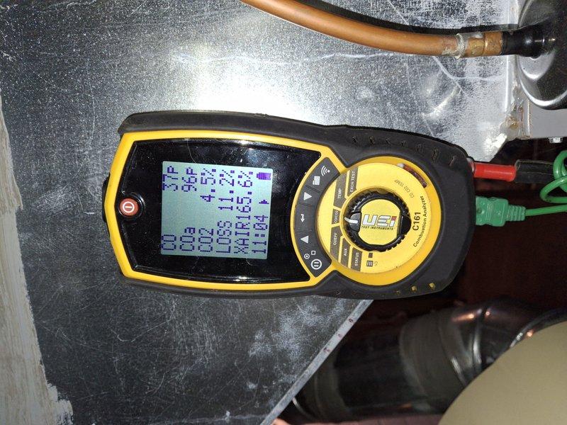 Performed annual maintenance on 3-year-old furnace under Home Plan Heating Tune Up service. Inspected burner assembly confirming proper flame pattern and color, and conducted combustion analysis using UEi diagnostic meter to verify optimal operating parameters. All electrical connections were checked and secured, and gas valve operation was verified with appropriate hi/lo settings functioning correctly.