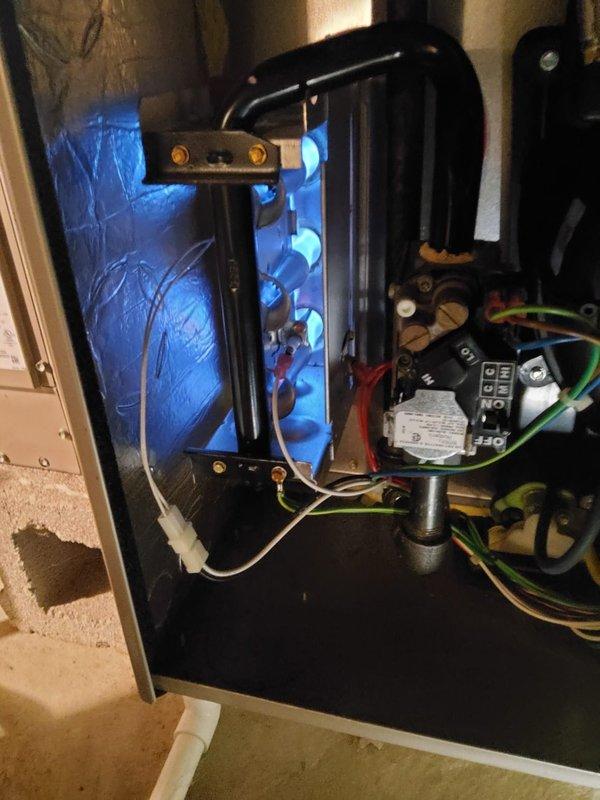 Performed scheduled heating maintenance on two systems. Inspected operational furnace with healthy blue flame pattern at heat exchanger. Noted significant oxidation and rust formation on second heat exchanger fins requiring documentation and monitoring. Both systems are currently functional with recommended follow-up on corrosion issues.