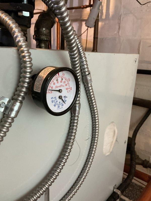 Performed scheduled maintenance on commercial boiler under 4-year MVP program. Inspected pressure gauge readings and verified system was operating within normal parameters. Examined all flexible conduits, copper piping, and connections for proper function and integrity. No issues detected during service.