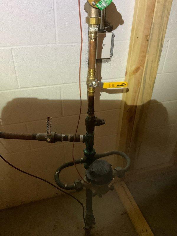 Successfully installed a Moen whole house shut-off valve system to replace the existing water control assembly. Work included connecting the new valve to the existing copper piping infrastructure and mounting the electronic Moen control module to the wall. System was tested and confirmed operational prior to completion.