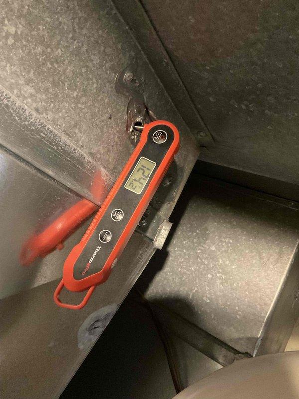 Performed furnace tune-up on 11-year-old system. Conducted temperature testing with digital probe thermometer, verifying readings at 62.7°F. Inspected burner assembly, confirming proper flame pattern and combustion. All electrical components, control board settings, and wiring connections were checked and confirmed to be in good working condition.