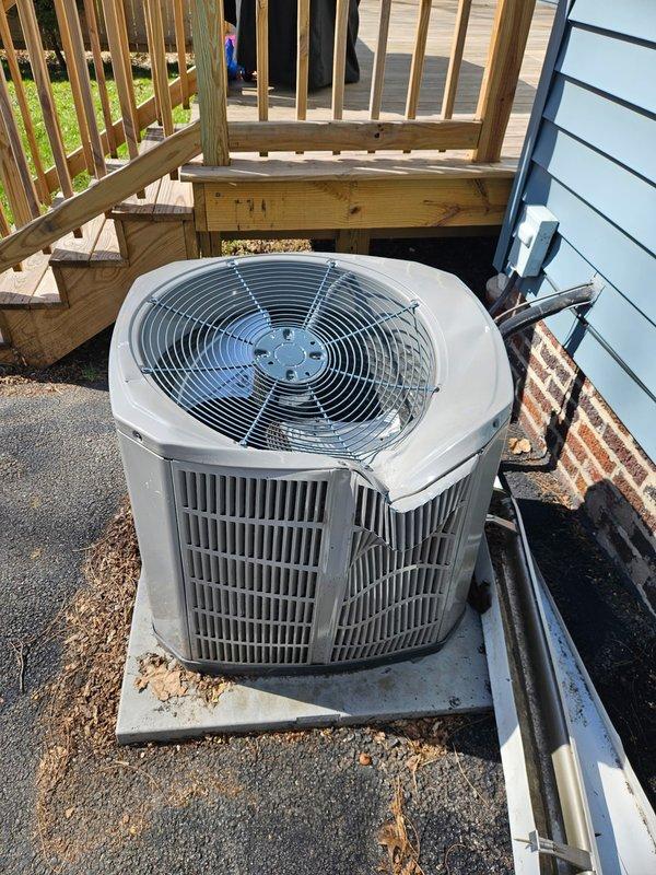 Responded to service call for AC system with damaged condenser unit caused by fallen frozen gutters. Performed diagnostic assessment of the outdoor condenser and inspected interior furnace components for related damage. System was approximately 5+ years old; documented current condition with photos of both exterior unit and indoor components for service records.