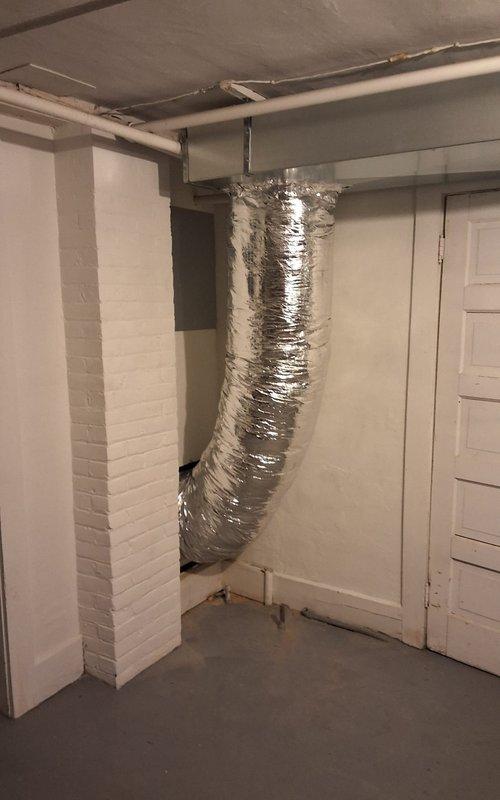 Successfully installed a complete Bryant HVAC system including a new outdoor AC unit mounted on a composite pad with proper electrical connections. Installed Unico high-velocity ductwork throughout the first floor, with flexible insulated ducts properly routed through the utility area to ensure efficient airflow distribution.