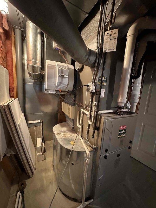 Successfully installed new furnace with high airflow base while integrating with existing dual return configuration. Reused 3" PVC venting, thermostat, humidifier and filter as specified. Performed pressure differential testing with manometer to verify proper system operation, confirming optimal airflow measurements of 150 on both intake and output.