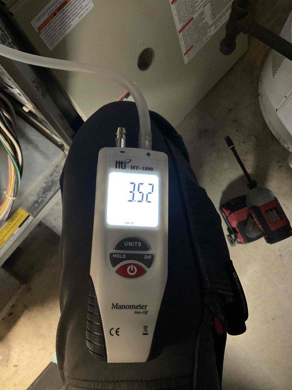 Performed routine heating maintenance service with diagnostic testing. Utilized HT-1890 digital manometer to measure gas pressure (35.2 reading) and conducted thermal measurements on the ductwork system to verify proper operation. All readings within acceptable parameters.