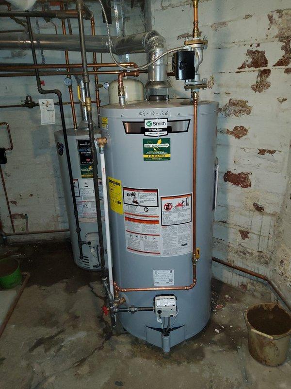 Responded to no hot water service call and found a leaking A.O. Smith hot water tank manufactured in 2006. Installed new water heater unit, including proper connection of copper supply lines, drainage, and metal vent piping. System was tested and confirmed to be functioning correctly with no leaks.