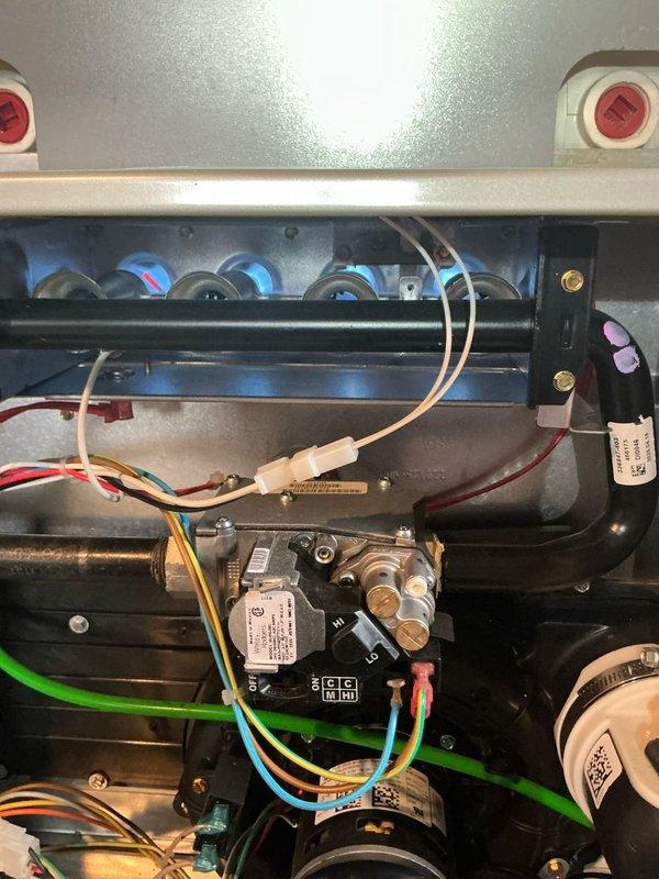 Responded to service call for no heat issue on gas furnace under 1 year old after power outage. Diagnostic inspection revealed error code "HEO" displayed on control board with amber indicator light illuminated. Inspected gas valve assembly, flame sensors, and wiring connections; reset system and restored proper heating operation. Unit now functioning normally within manufacturer specifications.