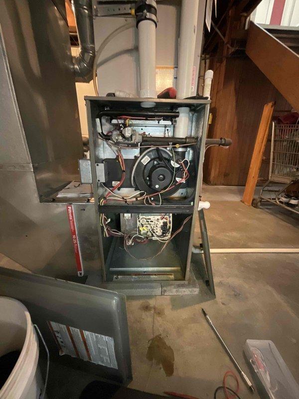 Performed scheduled heating system maintenance and tune-up on residential furnace. Conducted comprehensive temperature diagnostics using digital thermometer, confirming proper system operation at 71.2°F. Inspected and cleaned internal components including blower motor, circuit board, and ventilation connections to ensure optimal performance for the heating season.