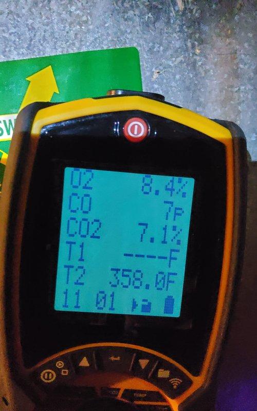 Responded to call for 10+ year old gas furnace blowing cold air. Performed combustion analysis with digital analyzer showing O2 at 8.4%, CO at 7ppm, CO2 at 7.1%, and stack temperature of 358°F. Inspection of furnace installation and connections confirmed proper setup with appropriate ductwork and drainage systems.