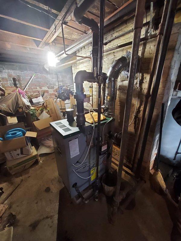 Successfully installed new gas steam boiler system in basement, including replacement of vapor stat, feeder, boiler feed pump (BFP), and thermostat. System was properly connected to existing piping infrastructure, with all components tested and verified operational after installation.