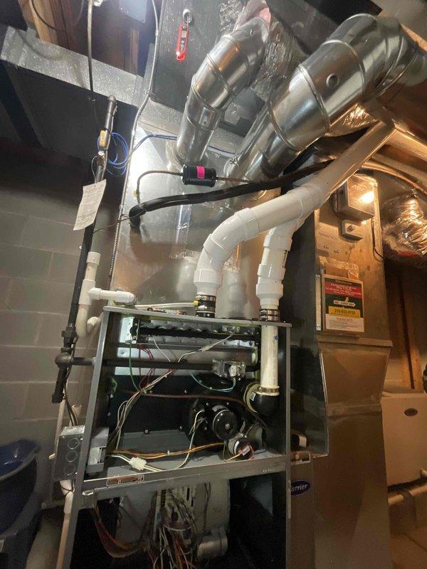 Performed scheduled maintenance on 10+ year old residential furnace system. Conducted full inspection of internal components including control board, wiring, and mechanical elements. Diagnostic testing completed using digital measurement tools, with all readings within acceptable parameters. System returned to proper working condition with no immediate concerns noted.