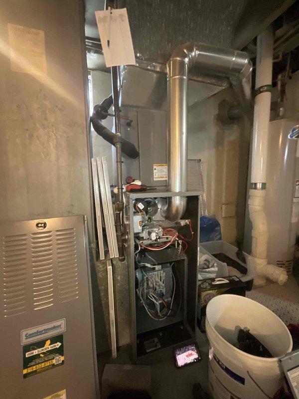 Performed scheduled maintenance on furnace system (Model MVP, 1-5 ton capacity). Conducted diagnostic testing with digital measurement tool showing 6.2 reading on ductwork. Inspected internal components including blower motor, wiring, and controls with panel removed; all components functioning within specifications.